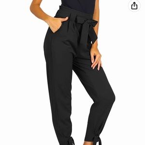 Black pants with bow detail